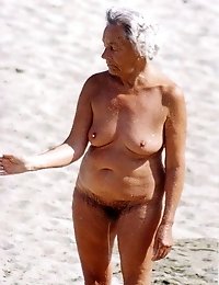 Granny super big tits slut shows pink pussy
